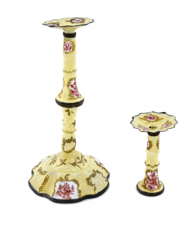 AN ENAMEL CANDLESTICK with