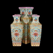 AN ENAMEL 'INTERLOCKING FLOWER