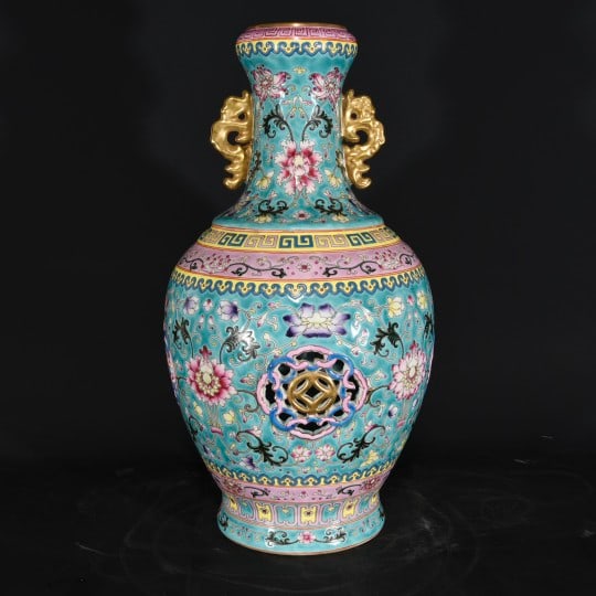 AN ENAMEL OPENWORK 'INTERLOCKING