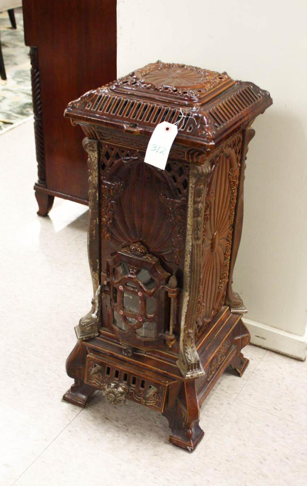 AN ENAMELED CAST IRON MULTI-FUEL