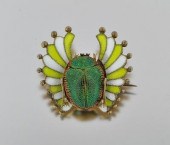 An Enameled Scarab Shape Brooc