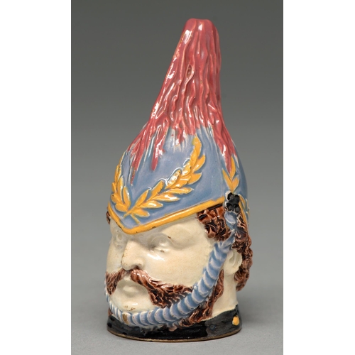 An enamelled creamware candle