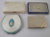 An enamelled silver powder com