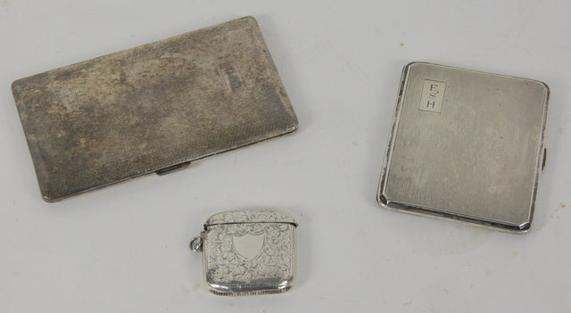 An engine turned silver cigarette