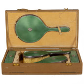 AN ENGLISH ART DECO CASED ENAM