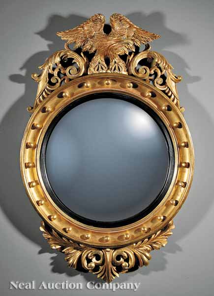 An English Carved and Gilded Convex