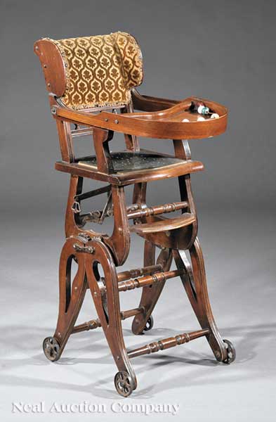 An English Carved Mahogany