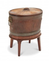 AN ENGLISH CARVED MAHOGANY CEL