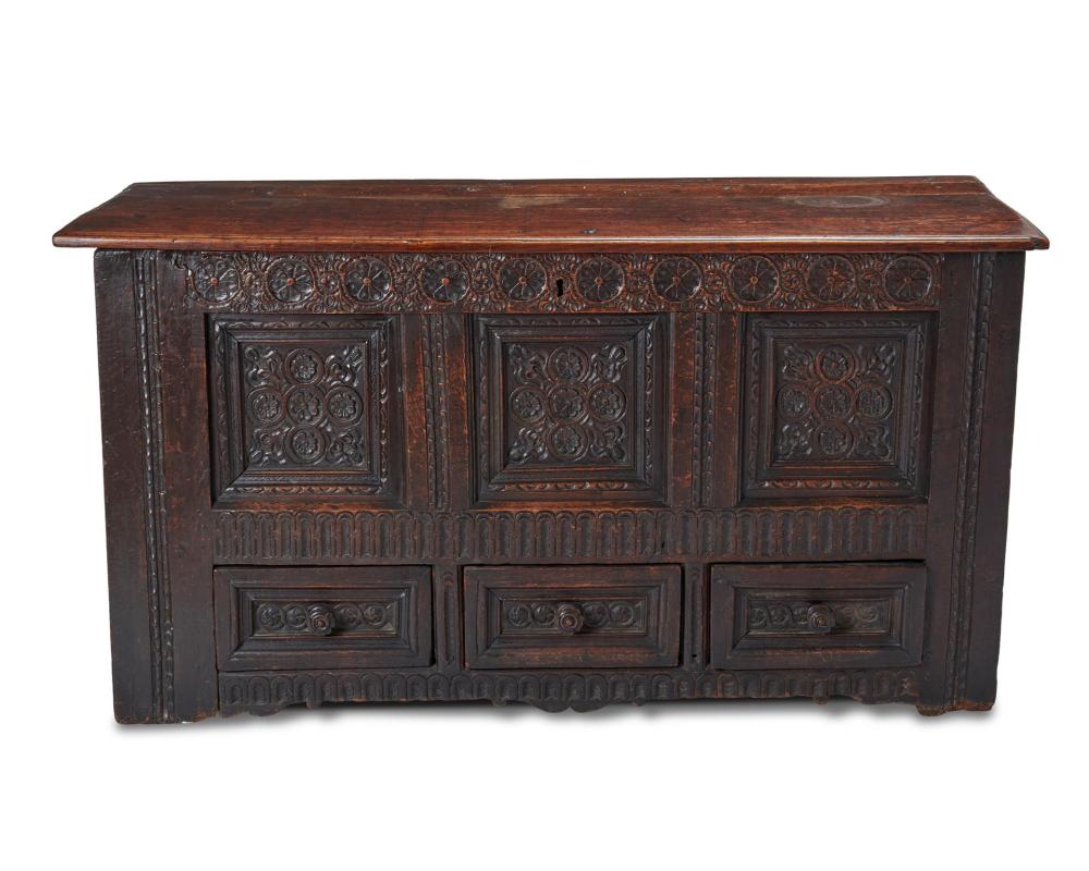 AN ENGLISH CARVED OAK BRIDAL