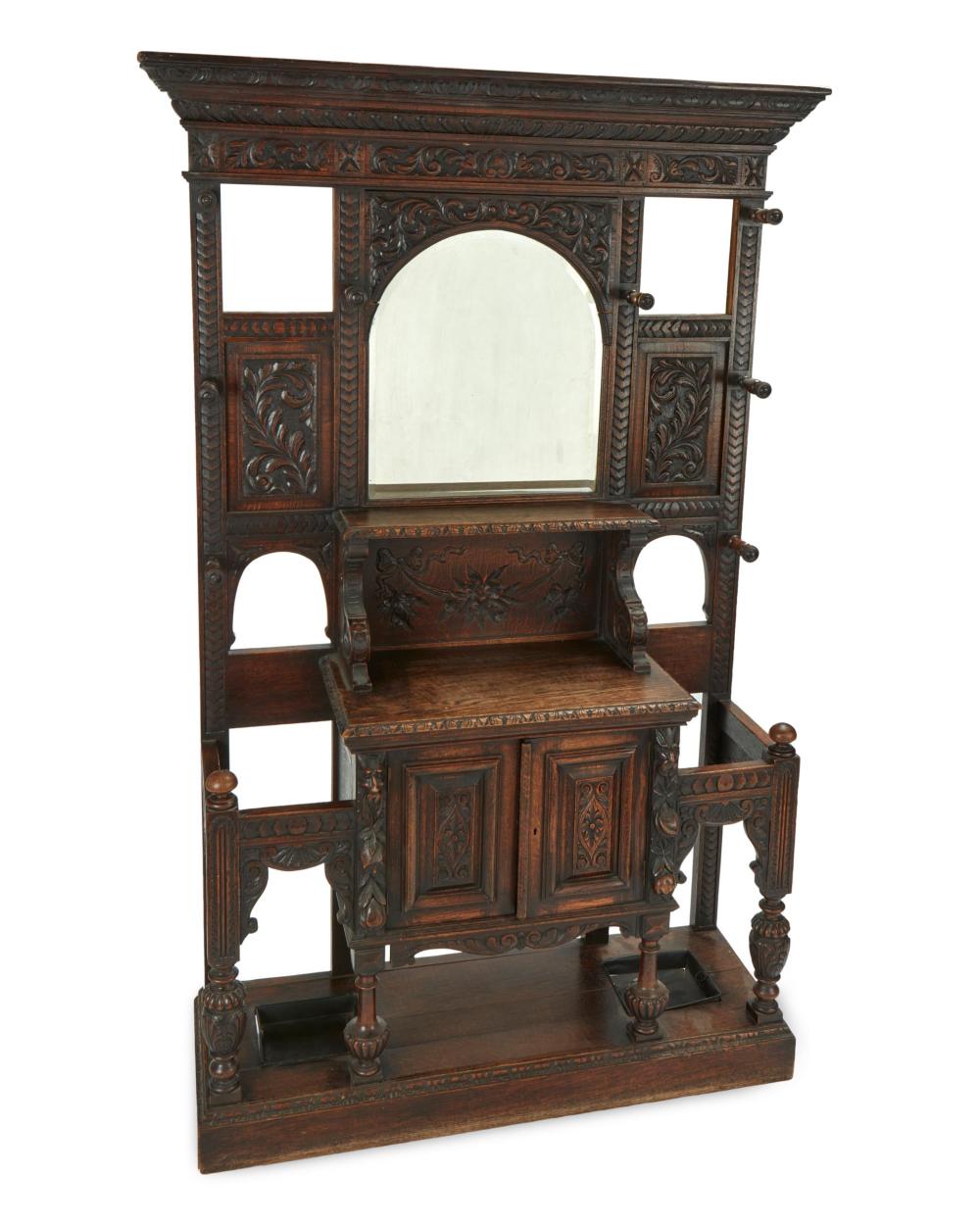 AN ENGLISH CARVED OAK HALL TREEAn