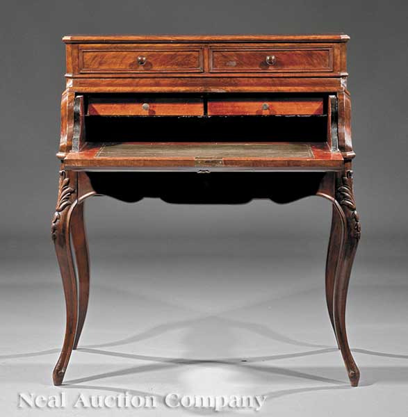 An English Carved Walnut Bureau