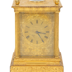An English Engraved Ormolu Carriage