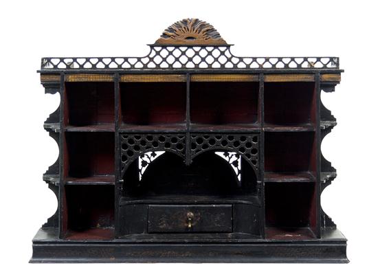 An English Lacquered Wall Shelf