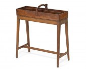 AN ENGLISH MAHOGANY CADDY ON S