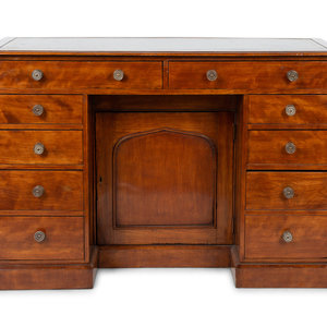 An English Mahogany Kneehole Desk