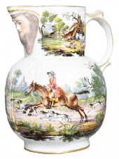 AN ENGLISH MASK JUG WITH HUNT