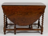 AN ENGLISH OAK GATE LEG TABLE