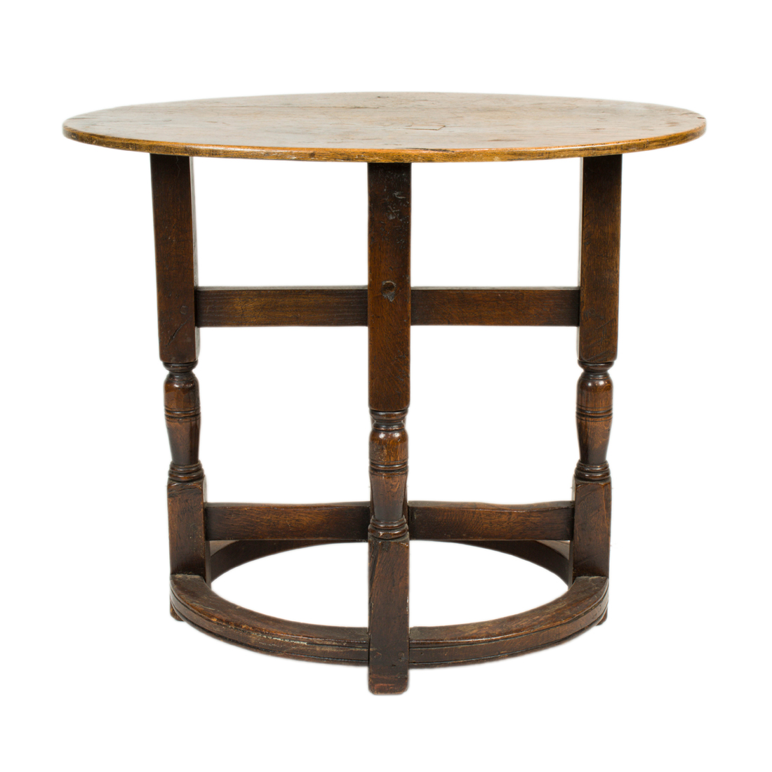 AN ENGLISH OAK TABLE IN THE