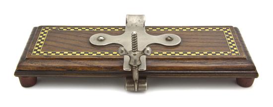 An English Oak Tie Press of typical