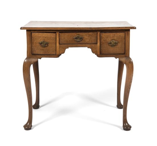 An English Queen Anne Oak Lowboy