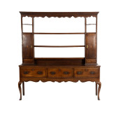 AN ENGLISH QUEEN ANNE OAK WELS