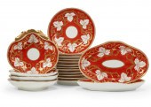 AN ENGLISH RED GROUND PORCELAI