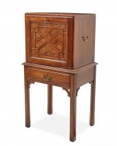 AN ENGLISH SILVER CABINETAn En