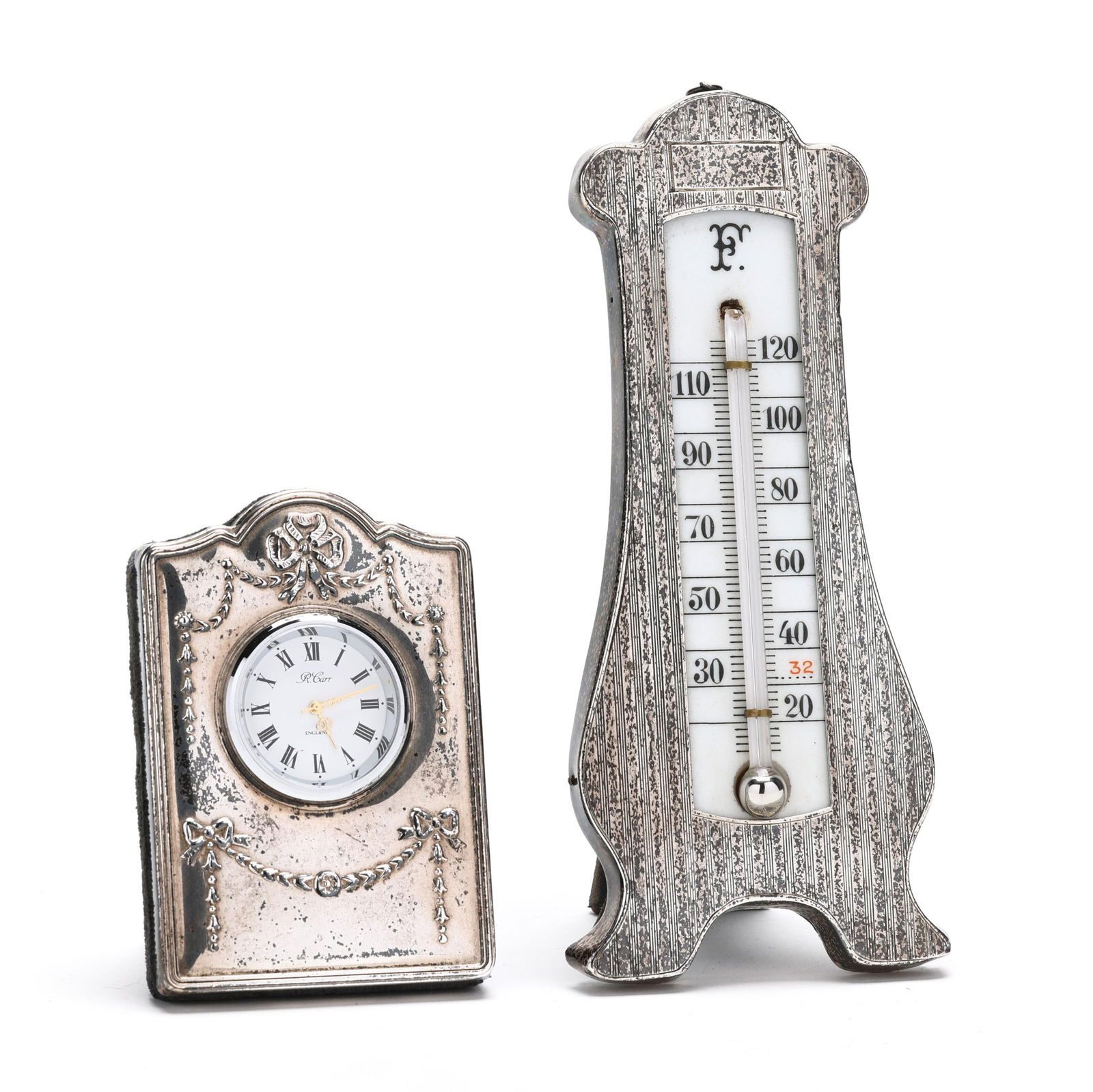 AN ENGLISH SILVER CLOCK AND