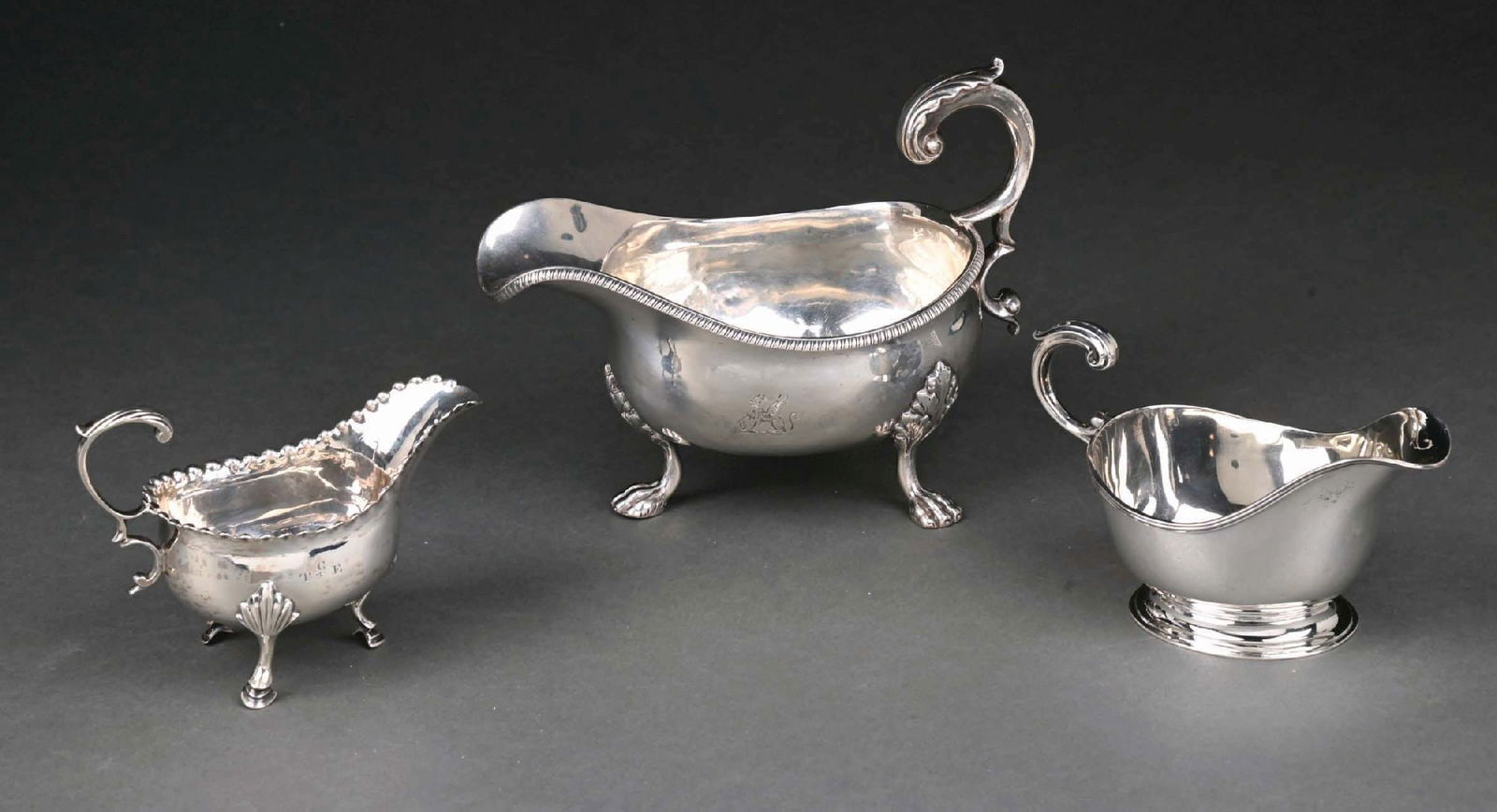 AN ENGLISH SILVER LARGE GRAVY