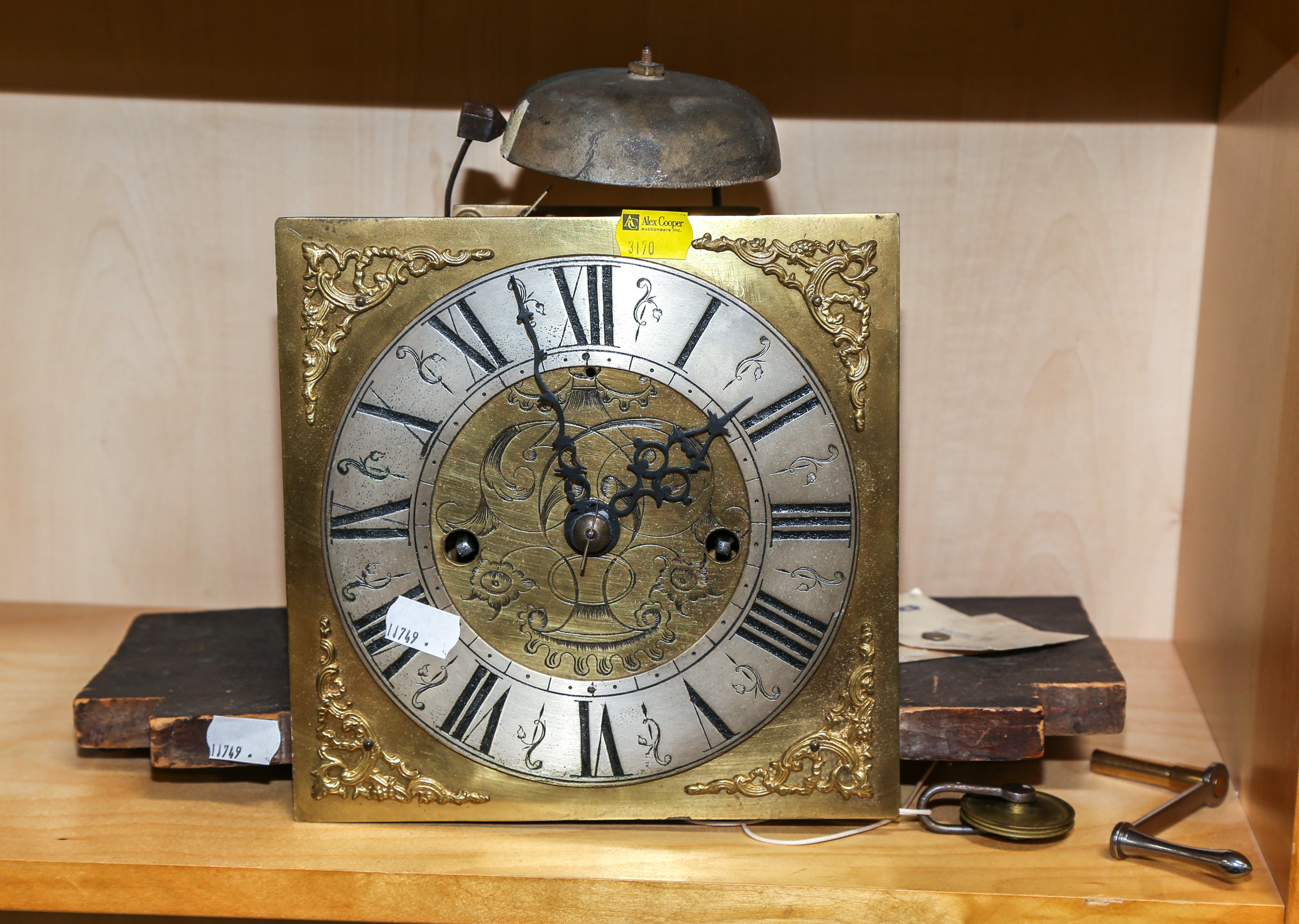 AN ENGLISH TALL CASE CLOCK