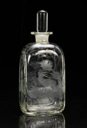 An Engraved Glass Decanter Sto