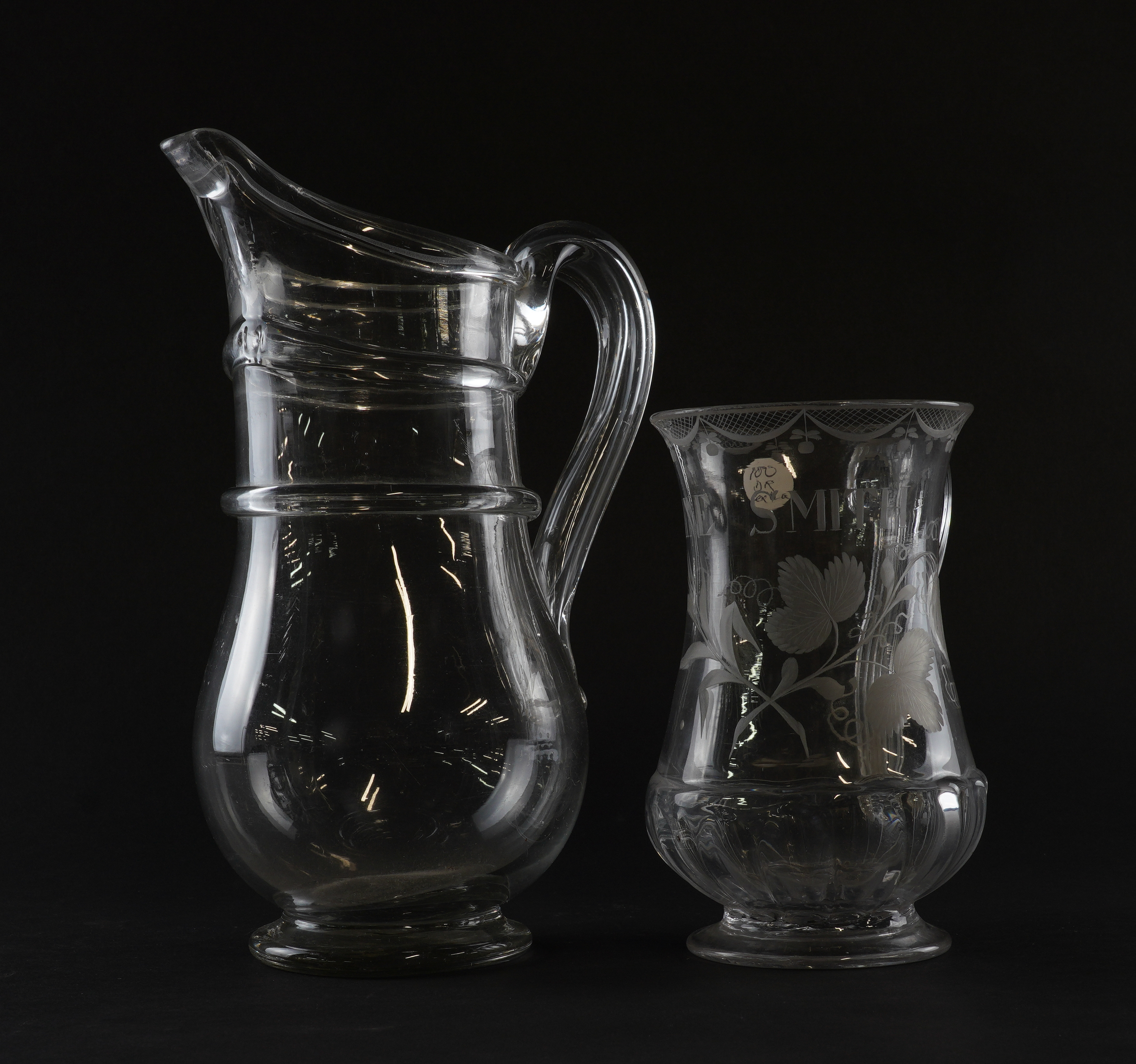 AN ENGRAVED GLASS TANKARD Late 18th