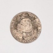 An engraved silver counter, Ja