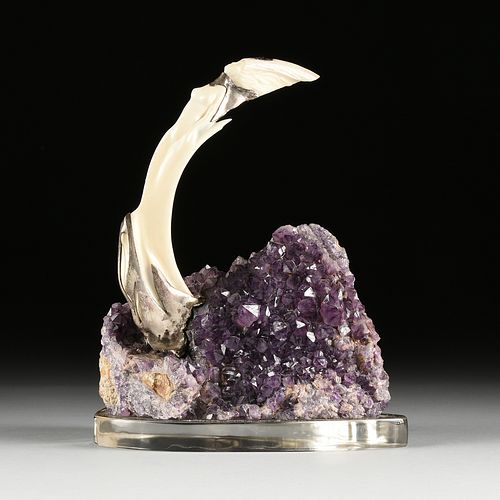 AN EROTIC NUDE ANTLER CARVING ON AN