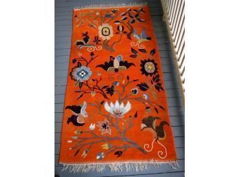 An floral motif handwoven rug