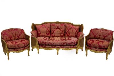 An gilt wood bergère suite in the