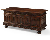 AN HENRI II-STYLE CARVED WALNU