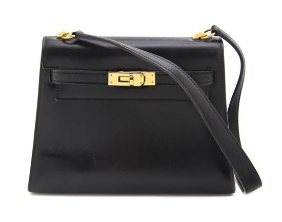 An Hermes Black Leather Mini