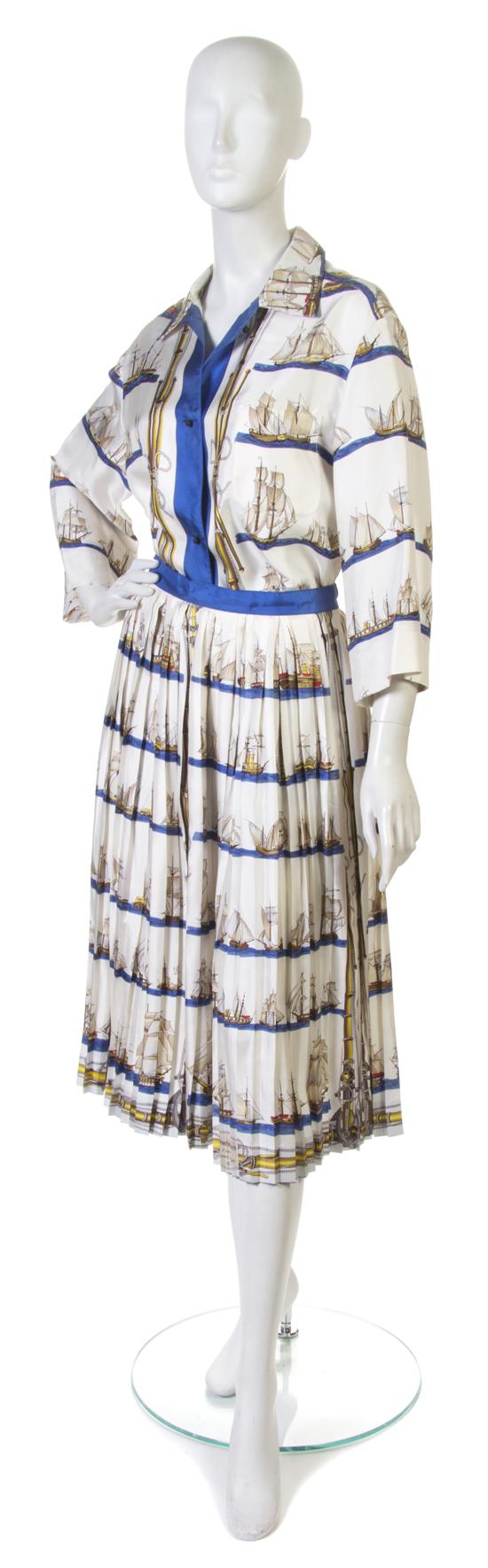 An Hermes Scarf Blouse and Skirt.