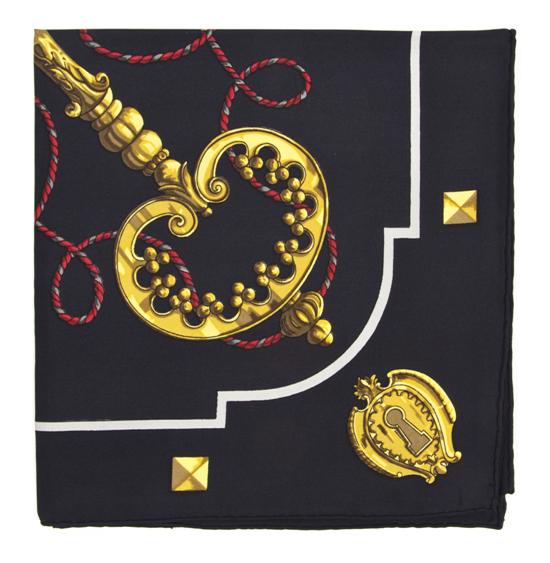 An Hermes Silk Scarf in a key