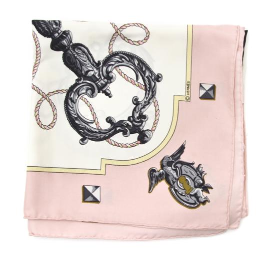An Hermes Silk Scarf in a key