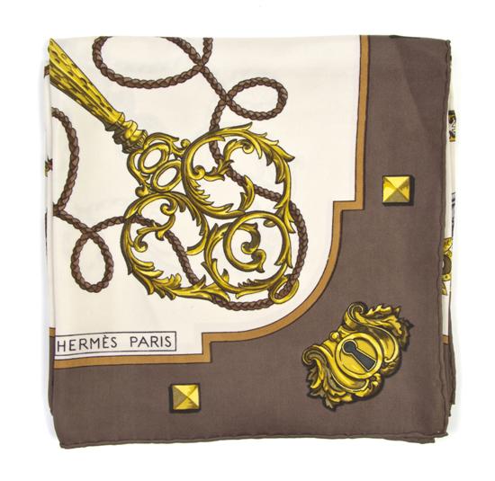 An Hermes Silk Scarf in a key