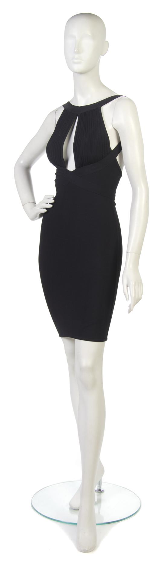 An Herve Leger Black Bandage Dress.