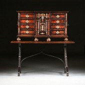 AN IBERIAN EBONIZED INLAID OAK