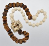 An Impressive Ivory and Tiger