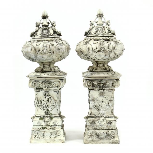 AN IMPRESSIVE PAIR OF LIDDED BRONZE