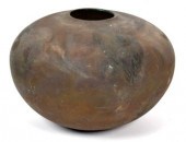 An impressively large raku ves