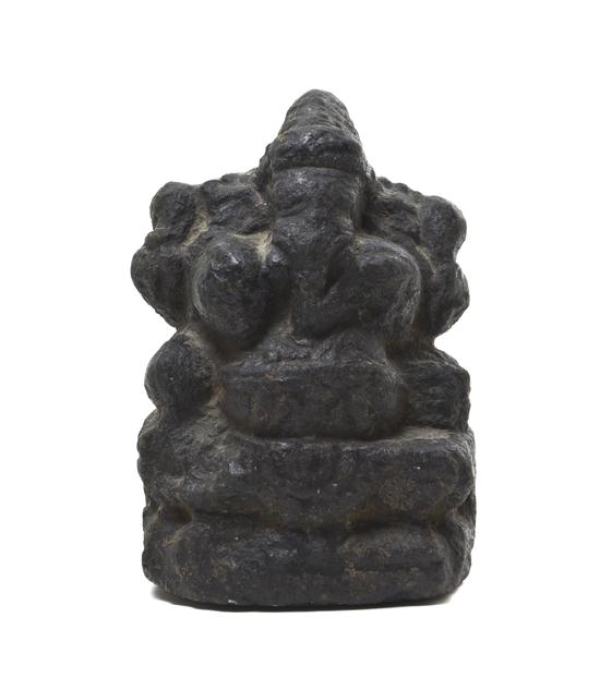 * An Indian Black Stone Figure of