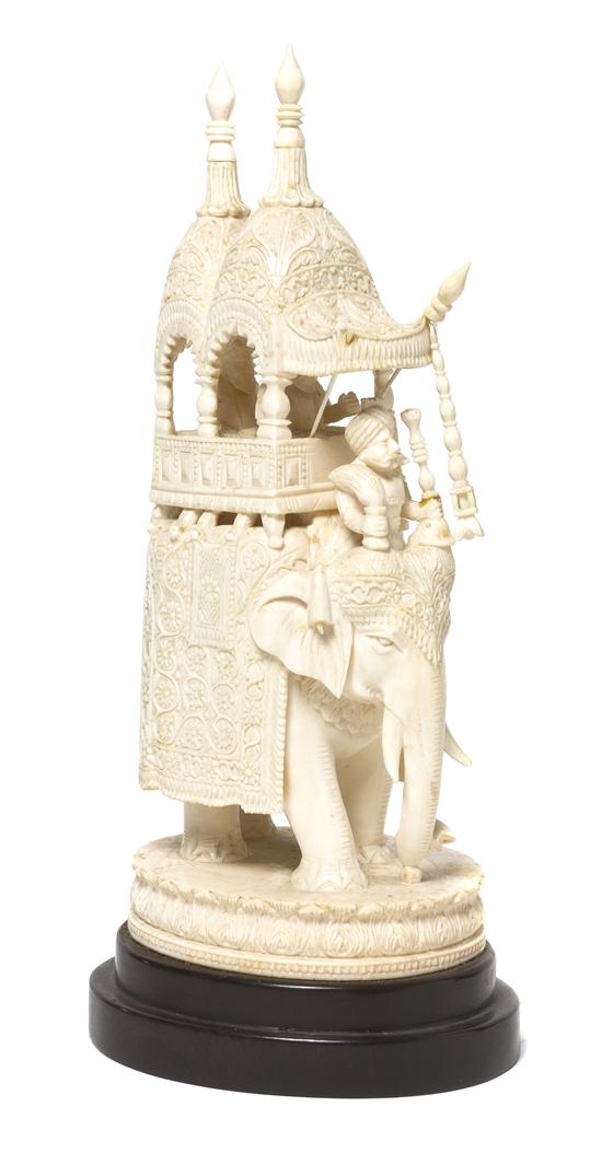 An Indian Carved Ivory Figural