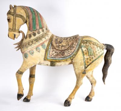 An Indian carved, painted and